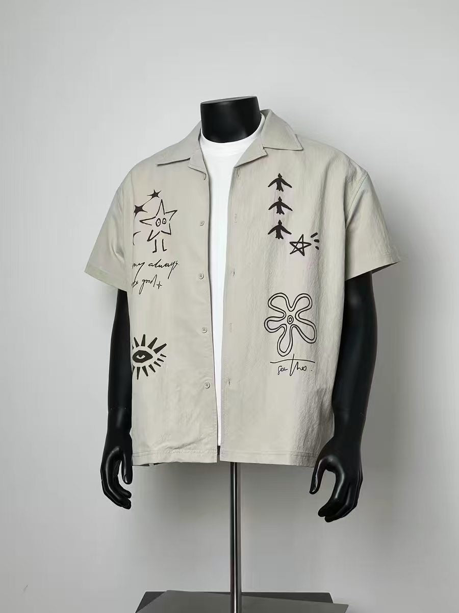 Men Hand Drawn Star Eye Bird Flower Graffiti Loose Fit Button Up Casual Resort Shirt